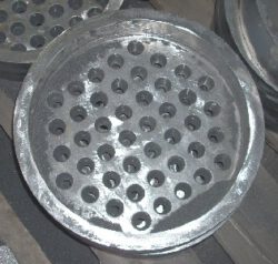 This is a round burner grate made of gray iron ASTM 319.