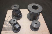 Oil pump parts cast in ductile iron including BOP, wellhead frame and stuffing box.